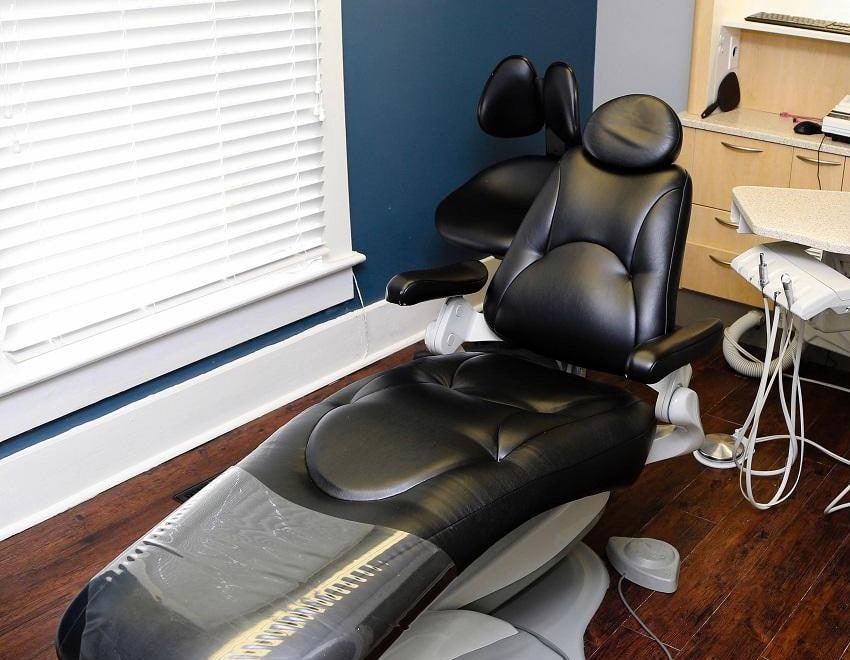 A treatment room at our Franklin office, with a blue accent wall and a window